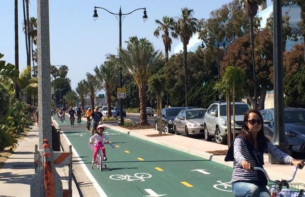 A two-way protected bike lane in Redondo Beach functions like a bike path on one side of the street.