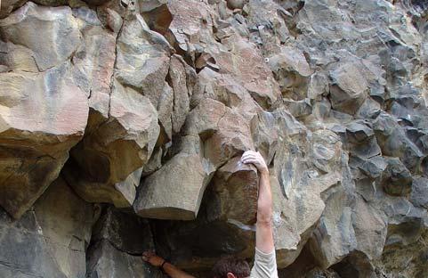 underclings, hidden holds. Most climbers concur: This climb is harder than 5.11B.