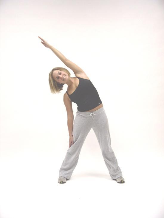 Tilting Star 1. 1. In inner winner posture, with your arms out to the sides and feet spread in the star position, pull your belly button in toward your spine. 2.