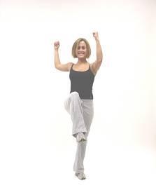 After raising your arms in hands up position, bring your left elbow across your torso toward your right knee.