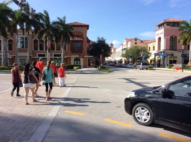 southbound crosswalk north of the median at SR 704 (Okeechobee Boulevard) and Florida Avenue / Rosemary Avenue.