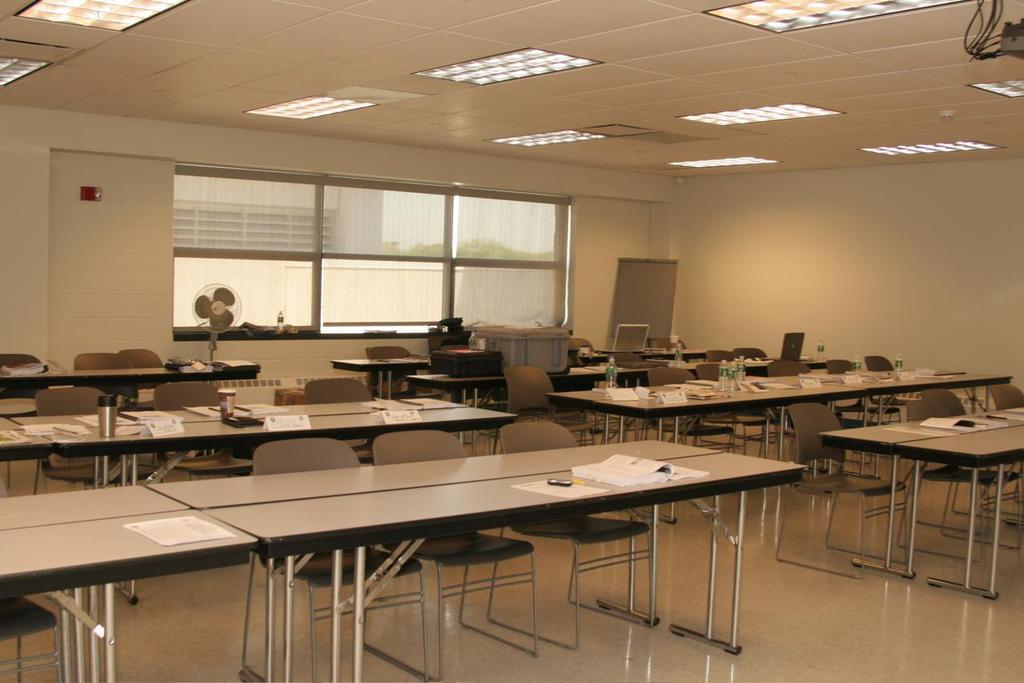 Environmentally-controlled (HVAC) classroom, including tables and chairs to