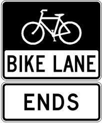 bicyclists and motorists of facilities and crossings; Regulatory signs, which inform bicyclists of specific