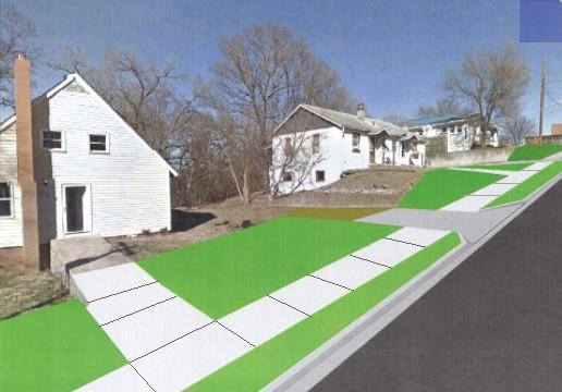 Design Considerations VAN BUREN STREET Proposed Improvements In order to accommodate upgraded sidewalks, and better control the storm water runoff, curb and gutter should be constructed along Van