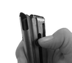 After inserting a magazine, always test to make sure it is locked in place by giving it a firm tap on the bottom of the magazine. fig. 5 4 Loading the chamber with the first cartridge fig.