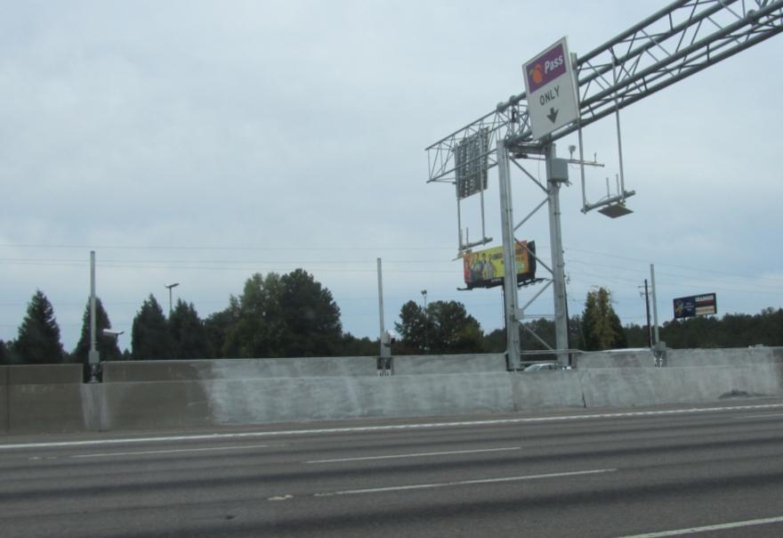 Image to the right: Construction components of I-85 Express Lanes. Project included a wide range of physical and logical components from rumble stripes covering double white lines to cameras.