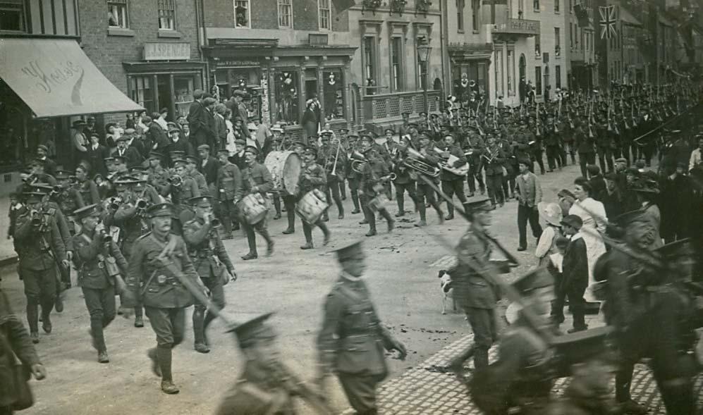 Top: 1914 and mobilisation. This picture, taken by Henry Hinge of Station Road in Ashbourne, shows the band and men of the 5 th Battalion leaving Derby on the 16 th August.