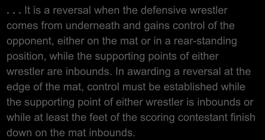 mat or in a rear-standing position, while the supporting points of either wrestler are inbounds.