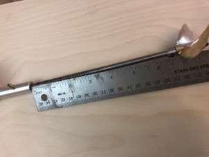 Measure from the back of the stinger to the drive dog. Subtract 3/8 inch.