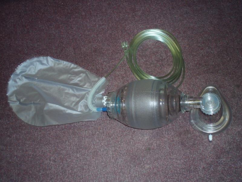 Bag-Valve-Mask device when taken out of packaging Bag-Valve-Mask device assembled ready for use Action: Place the patient supine with the head in a sniffing position, i.e. neck slightly flexed with the head tilted backwards on the neck.