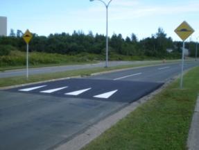 Transportation System Improvements Speed Humps Raised Crosswalk Excessive volume of cut-through traffic on neighbourhood streets may be diverted back onto arterial or collector streets if motorists