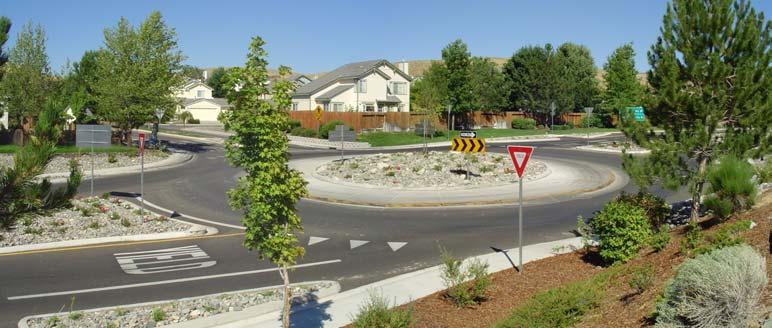 2. 4. 2 R O U N D A B O U T A roundabout is similar to a traffic circle. It also has a raised island placed in an intersection with circulating traffic. However, there are differences.