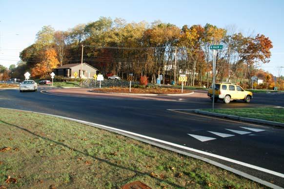 However, roundabouts can be difficult for large vehicles with large turning radii to use, and must be designed with a truck apron at the center over which the rear wheels of large vehicles can safely