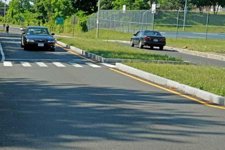 They provide a pedestrian resting space and strong visual cue to drivers, enhancing pedestrian safety. If landscaped, they provide aesthetic benefits.
