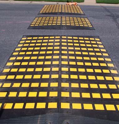 SPEED CUSHIONS What are Speed Cushions? Speed cushions are a series of small speed bumps with space between them.