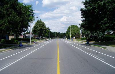 Neighbourhood Traffic Management Guide Page 22 Level I traffic calming measures include: Pavement markings; Textured pavement and crosswalks; Lane narrowing; Increased on-street parking; and Roadside