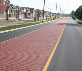 Advantages: Slows traffic Separates opposing flows of traffic Can improve street appearance Can function as a pedestrian refuge, and as a result, may reduce vehicle-pedestrian conflicts.