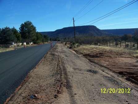 SIDE OF PHOTO TO CREATE 4- FOOT WIDE PAVED SHOULDERS FULL-DEPTH RECLAMATION OF