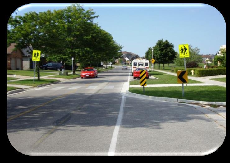 A corner radius reduction may also improve pedestrian safety to a certain degree by shortening the crossing distance.