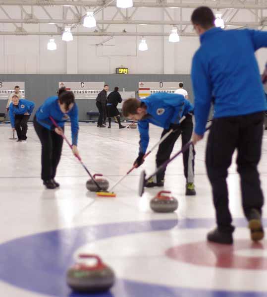 Teamwork in action at the Rotators Bonspiel on November 24-25 from Greg