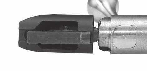 aligned with the center of the bolt handle base. (See Figure 8b.
