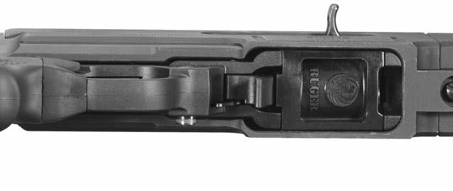 OPERATION OF SAFETY The RUGER SR-22 TM RIFLE has a cross-button safety which is located in the forward portion of the trigger guard (See Figure 2, p. 9.