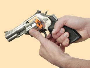 To Load a Double-Action Revolver Always refer to the owner s manual for information specific to your handgun.