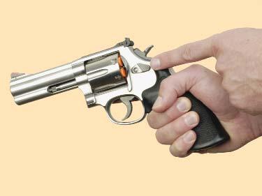 The steps to unload a double-action revolver are: 1. Release the cylinder latch. Step 1 2. Swing the cylinder out.