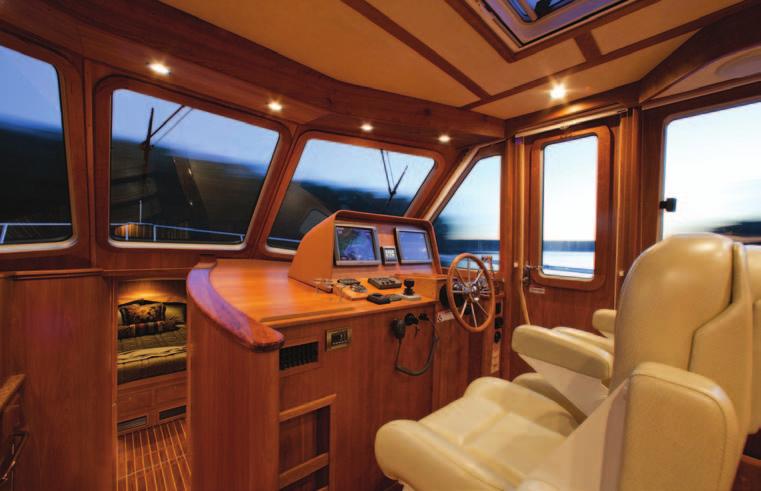 Outboard a swing door provides access to the side deck as well as ventilation while underway.