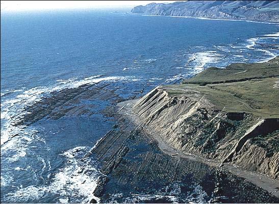 Wave attack causes the land to be eroded back, leaving a wave-cut terrace Wave-cut terraces