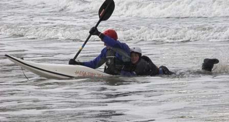 In a kayak/ski approach and transport a swimmer to shore In the surf zone the student will demonstrate the ability to piggy back a swimmer on the stern or bow of their kayak and transport them into