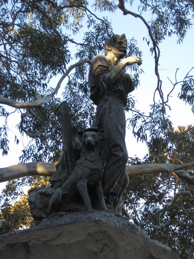 If you walk through the gardens and out near the Art Gallery of New South Wales go left on The Domain and look for the statue of Henry Lawson and His Dog.