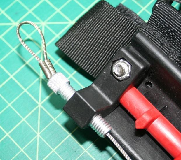 Trim off any excess cable length that you might have sticking out from your crimped loop. 8.