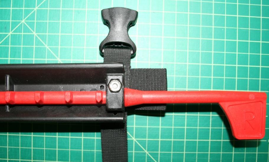 Hand tighten with your screwdriver until snug. 8. Once re-assembled, the adjustable straps should be rotated/positioned perpendicular to the footbrace assembly.