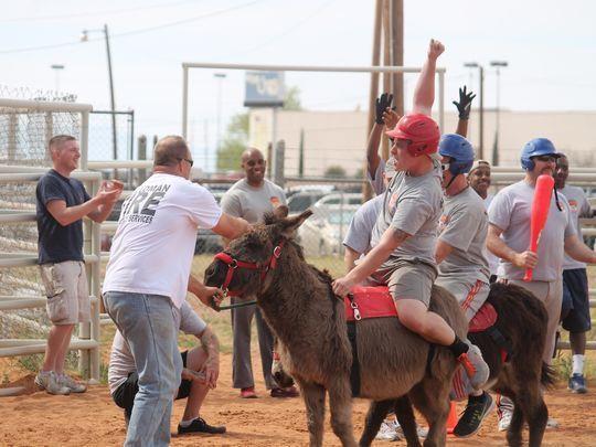 play baseball all while riding a donkey!