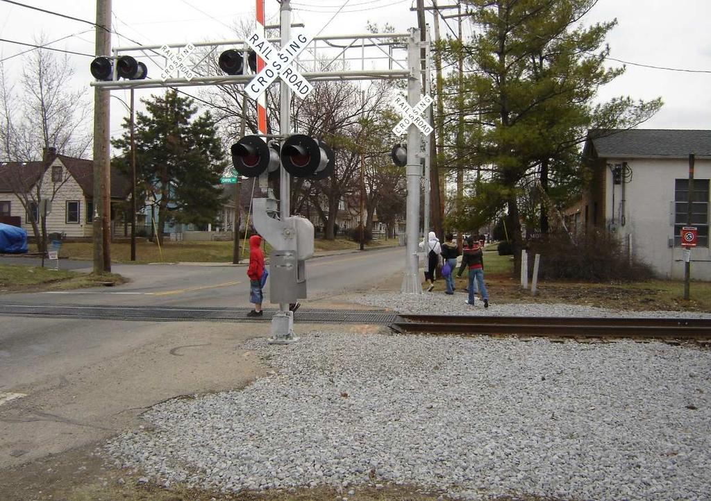 Photo Log Photo 1: View looking south along Hague Avenue at the RR crossing.