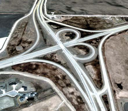 INTERCHANGE Road junction where two roads meet at different levels.