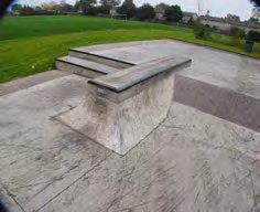 Wedge to wedge banks with a flat and roof top ledge, 21/2 foot hip, 3 foot cantilevered bank.
