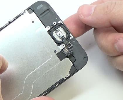 Step 16: Gently push the top left corner of the home button up away from the front panel.