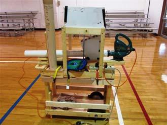 One player has gotten inventive and has made an automatic ball serving machine.