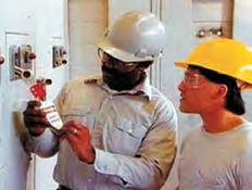 OSHA defines Lockout as, The placement of a lockout device on an energy-isolating device, in accordance with an established procedure, ensuring that the energy-isolating device and the equipment