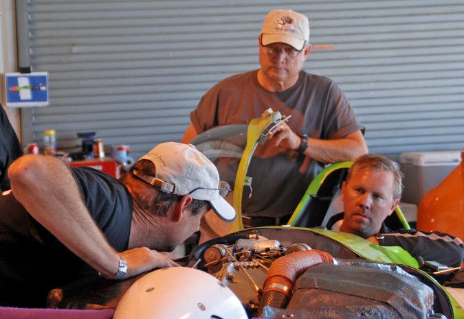 Get those planes out of the hangar, or off the trailers, and start flying them. Don Waters, Paul Remaley, and Brian Reberry troubleshoot #13 N-A-Rush after the plane would not start for Heat 1B.