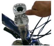 Checking and adjusting your bicycle Handlebars Keeping your bicycle in the upright position: stand with a leg either side of the front wheel, holding the wheel firmly