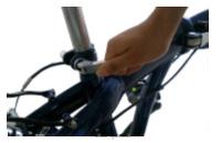 The mid-section of the handlebars must be aligned with the front wheel. Tighten into place. Saddle Sit on your bicycle to gauge a suitable position for use.