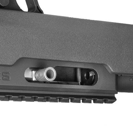 line is visible FIGURE 9 FIGURE 10 Look into the ejection port and check the chamber to be sure no cartridges are present (FIGURE