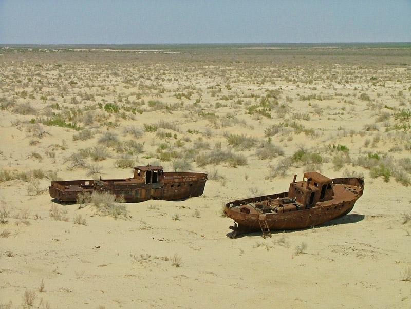 This photo shows abandoned boats in the now dry parts of the Aral Sea.