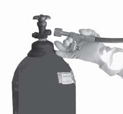 CO2 bottle end open (Figure 2) and expelling any remaining chemical and gas in a safe place.