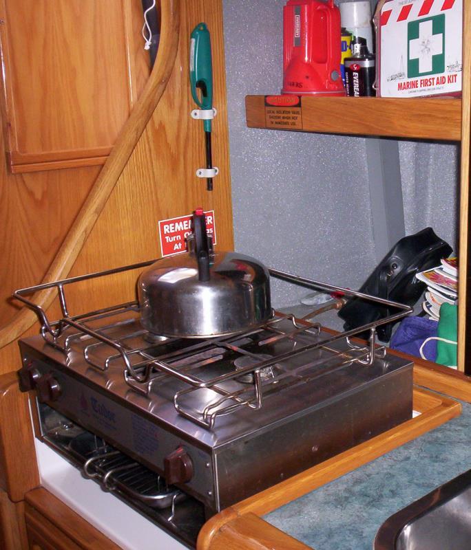 Gas Stove To operate the gas stove Ensure the gas isolation valve located in the locker behind the stove is turned to the on position.