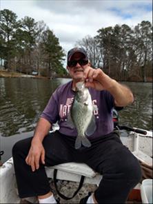 We started catching one crappie after another with Russell catching the first one that weighed out at 1lb 2 oz and then I promptly got hooked up with a fish near the same size.
