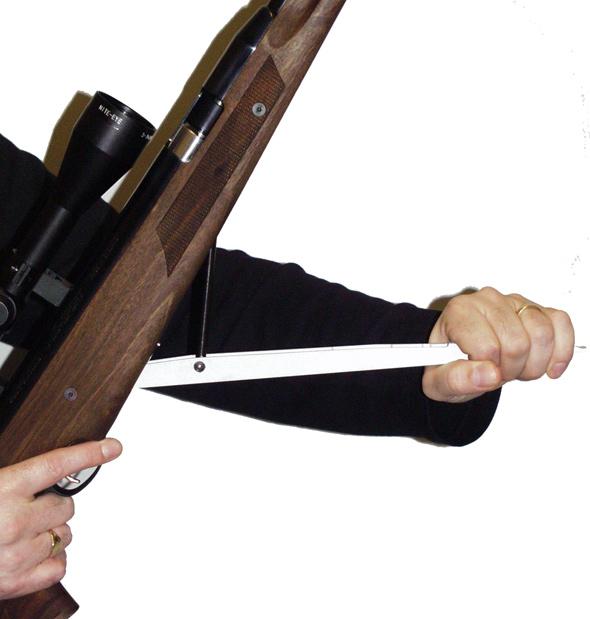 OPERATING INSTRUCTIONS To cock the rifle hold securely in one hand and with the other pull the cocking lever downwards until the trigger mechanism engages and the safety catch
